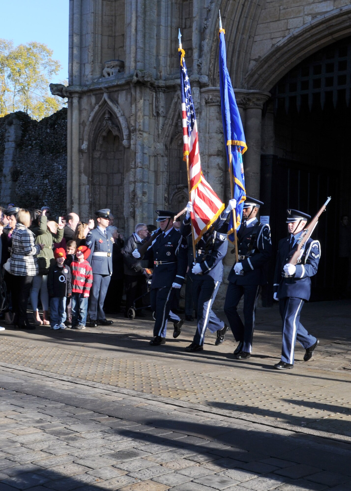 U.S. Airmen from the RAF Mildenhall Honor Guard march during a Remembrance Day ceremony Nov. 11, 2012, in Bury St. Edmunds, England. Remembrance Day is held in November each year to honor members of the armed forces who have died in the line of duty. (U.S. Air Force photo by Staff Sgt. Tabitha M. Lee/Released)