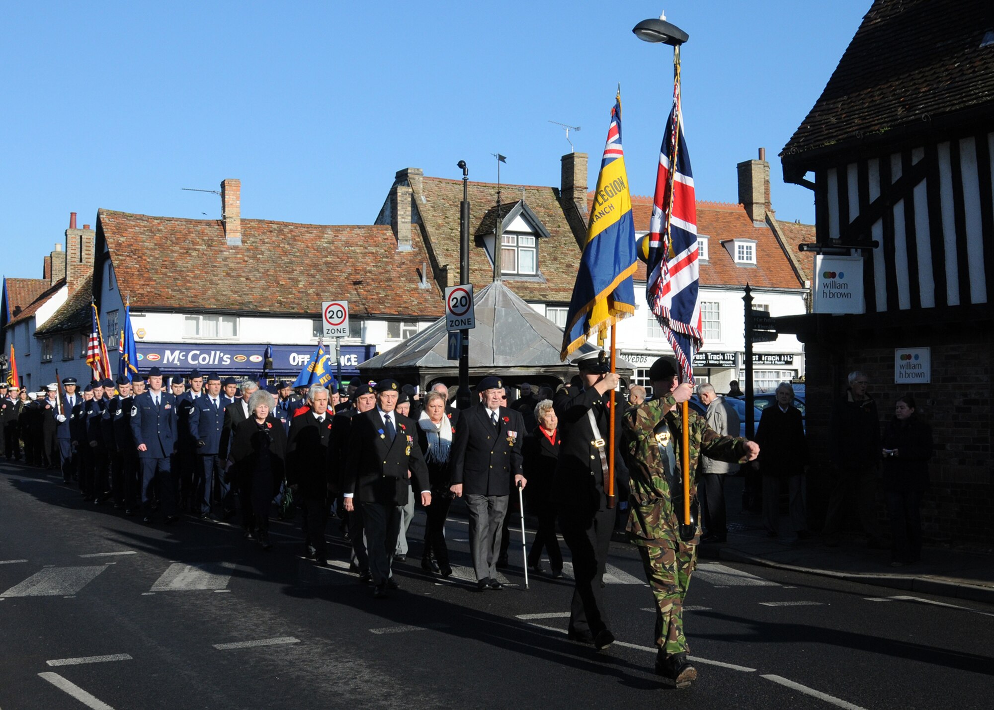 Participants march during a Remembrance Day parade Nov. 11, 2012, in Mildenhall, England. The parade consisted of participants from the Royal Air Force, U.S. Airmen from RAF Mildenhall, civic leaders, military cadets and others. (U.S. Air Force photo by Tech. Sgt. Neal X. Joiner/Released)
