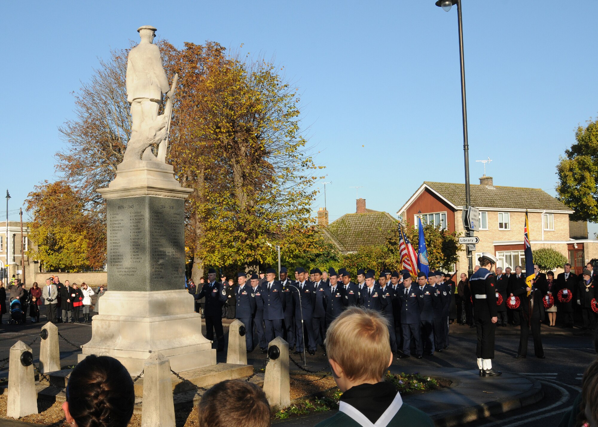 U.S. Airmen from RAF Mildenhall stand in formation during a Remembrance Day ceremony Nov. 11, 2012, in Mildenhall, England. Remembrance Day is held in November each year to honor members of the armed forces who have died in the line of duty. (U.S. Air Force photo by Tech. Sgt. Neal X. Joiner/Released)