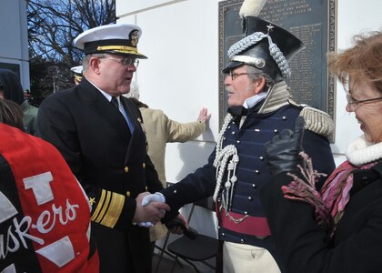 Omaha, Neb. - Vice Adm. Timothy M. Giardina, the deputy commander of U.S. Strategic Command at Offutt Air Force Base, Neb., converses with a veteran Nov. 11, 2012 at Omaha&#039;s Memorial Park. Veterans Day is an official federal holiday which honors people who have served in armed forces. It coincides with other holidays observed around the world, such as Armistice Day and Remembrance Day, and also marks the anniversary of the end of World War I.