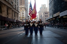 NEW YORK -- A Marine color guard from 6th Communications Battalion, Marine Forces Reserve, marched in the annual New York Veterans Day parade, here, Nov. 11.  The parade is hosted by the United War Veterans Council, Inc. on behalf of the City of New York. It is the oldest and largest of its kind in the nation. Since November 11, 1919, the parade has provided an opportunity for Americans and International visitors to honor those who have served in the nation’s largest city. (Official Marine Corps photo by Cpl. Daniel A. Wulz)