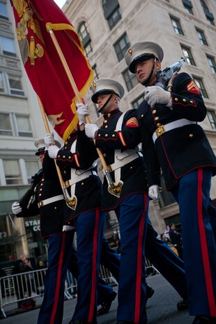 NEW YORK -- A Marine color guard from 6th Communications Battalion, Marine Forces Reserve, marched in the annual New York Veterans Day parade, here, Nov. 11.  The parade is hosted by the United War Veterans Council, Inc. on behalf of the City of New York. It is the oldest and largest of its kind in the nation. Since November 11, 1919, the parade has provided an opportunity for Americans and International visitors to honor those who have served in the nation’s largest city. (Official Marine Corps photo by Cpl. Daniel A. Wulz)