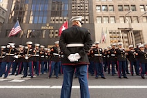 NEW YORK -- A Marine from 6th Communications Battalion, Marine Forces Reserve, paused his formation as they marched in the annual New York Veterans Day parade, here, Nov. 11.  The parade is hosted by the United War Veterans Council, Inc. on behalf of the City of New York. It is the oldest and largest of its kind in the nation. Since November 11, 1919, the parade has provided an opportunity for Americans and International visitors to honor those who have served in the nation’s largest city. (Official Marine Corps photo by Bryan Nygaard)