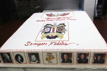Images of the Marine Corps' first and present commandants flank the Eagle, Globe and Anchor on the Marine Corps Forces Central Command 237th Birthday Ball Cake. The cake included the images of all the Corps' commandants.  
