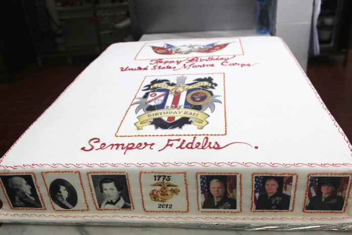Images of the Marine Corps' first and present commandants flank the Eagle, Globe and Anchor on the Marine Corps Forces Central Command 237th Birthday Ball Cake. The cake included the images of all the Corps' commandants.  
