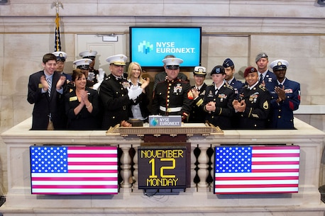 NEW YORK, NY - NOVEMBER 12:  United States Marine Corps Major General Michael G. Dana, and Members of the U.S. Armed Forces, ring the opening bell to Commemorate Veterans Day at the New York Stock Exchange on October 12, 2012 in New York City. (Photo by Dario Cantatore/NYSE Euronext)