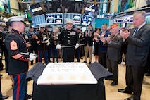 NEW YORK, NY - NOVEMBER 12:  United States Marine Corps Major General Michael G. Dana, and Members of the U.S. Armed Forces, ring the opening bell to Commemorate Veterans Day at the New York Stock Exchange on October 12, 2012 in New York City. (Photo by Dario Cantatore/NYSE Euronext)