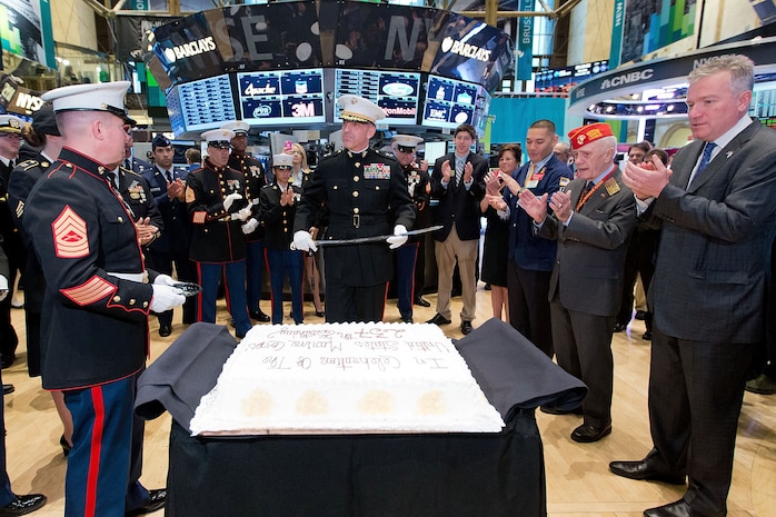 NEW YORK, NY - NOVEMBER 12:  United States Marine Corps Major General Michael G. Dana, and Members of the U.S. Armed Forces, ring the opening bell to Commemorate Veterans Day at the New York Stock Exchange on October 12, 2012 in New York City. (Photo by Dario Cantatore/NYSE Euronext)
