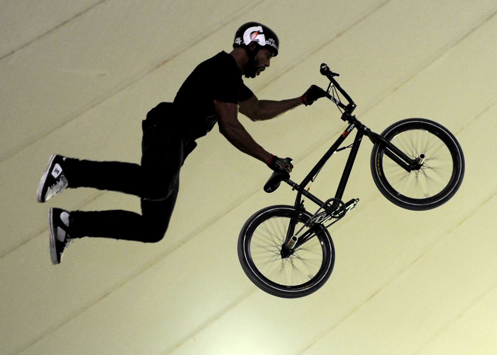 SOUTHWEST ASIA – Bikes over Baghdad performer, Mykel Larrin, flies off the ramp during a performance for U.S. Armed Forces and Coalition members Nov. 11, 2012. This was the first stop of their tour across the area of responsibility. (U.S. Air Force/Senior Airman Joel Mease)