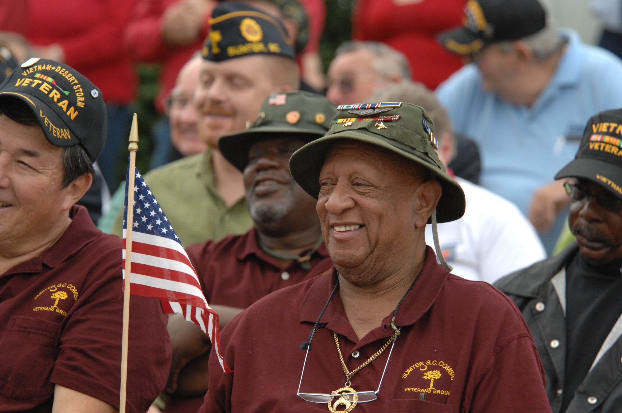 Veterans laugh during World War II prisoner of war, retired Senior Master Sgt. Kenneth Duffy’s remarks, at the Veterans Day Ceremony, Sumter, S.C., Nov. 12, 2012.  (U.S. Air Force photo by Staff Sgt. Ave I. Young/Released)