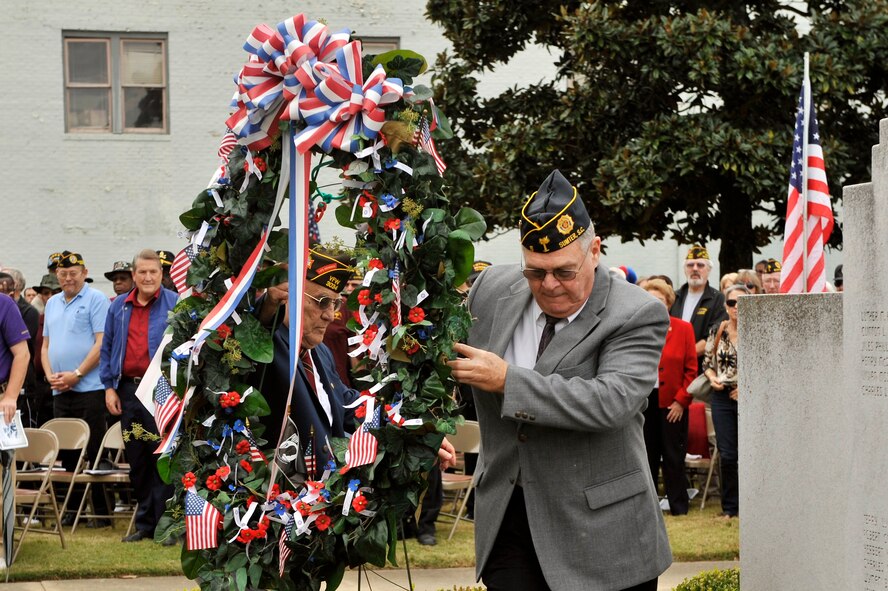 Members from the American Legion Post and VFW Post 3034 lay a memorial wreath during the Veterans Day ceremony at the Sumter County Court House, Sumter, S.C., Nov. 12, 2012.  (U.S. Air Force photo by Staff Sgt. Ave I. Young/Released)