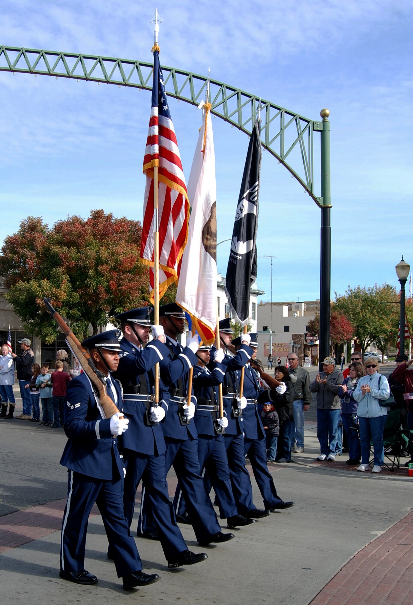 The Beale Air Force Base Honor Guard leads the Yuba-Sutter Veterans Day Parade through downtown Marysville, Calif., Nov. 11, 2012. More than 400 Team Beale Airmen participated in the parade. (U.S. Air Force photo by Capt. Brian Wagner/Released)