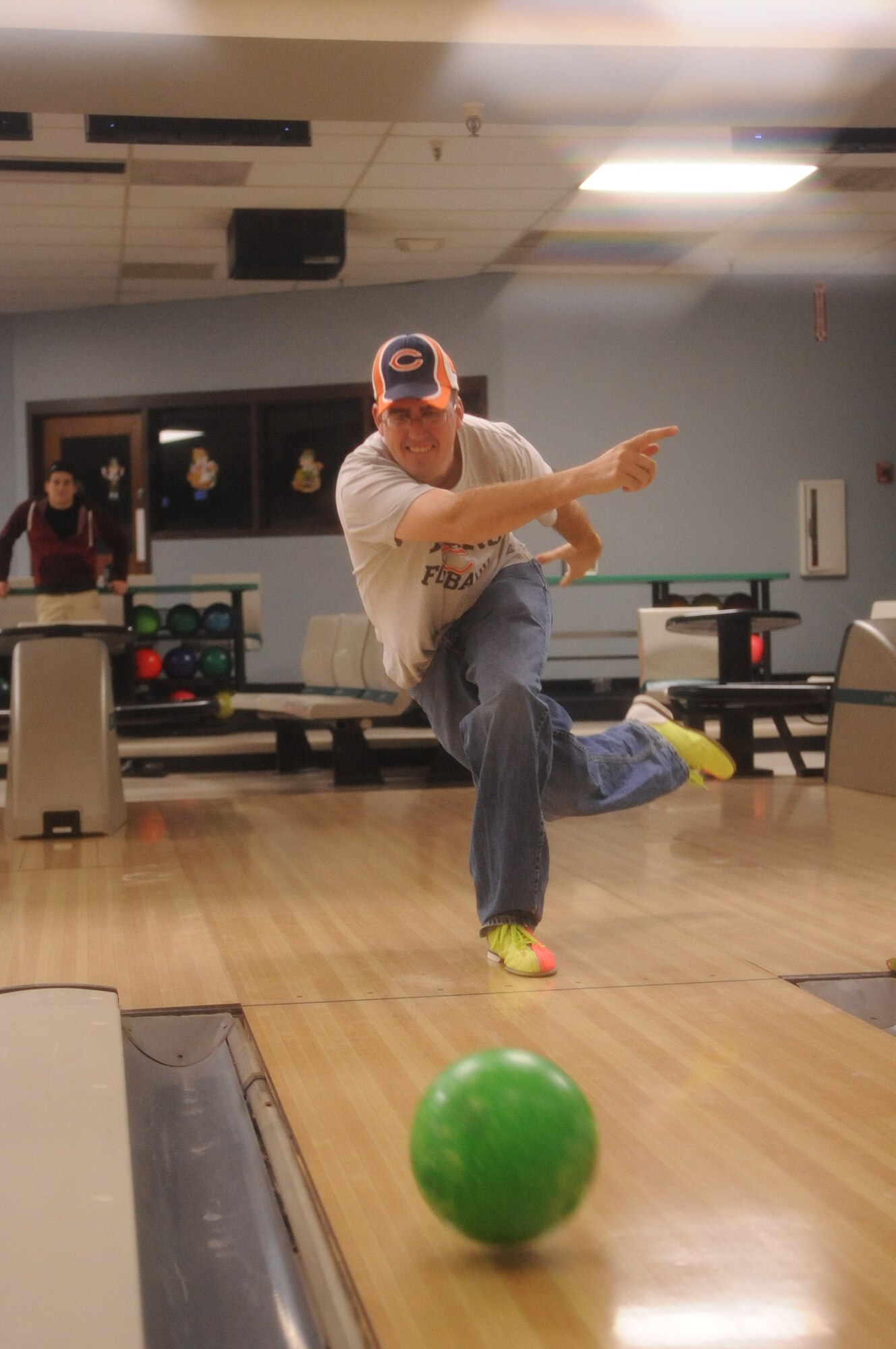 Staff Sgt. Ben Dye, 319th Civil Engineer Squadron Structures, launches a ball down the lane during the 2012 Combined Federal Campaign Bowl-a-thon, Nov. 6, 2012 at the Dakota Lanes Bowling Alley on Grand Forks Air Force Base, N.D.  The CFC event was sponsored by the Grand Forks AFB Top 3, the installation’s professional military organization for enlisted service members in the top three pay grades of E-7 through E-9. All profits from the fundraiser were donated to the 319th Air Base Wing's Airman & Family Readiness Center through the CFC. (U.S. Air Force photo/ Staff Sgt. Amanda N. Grabiec)