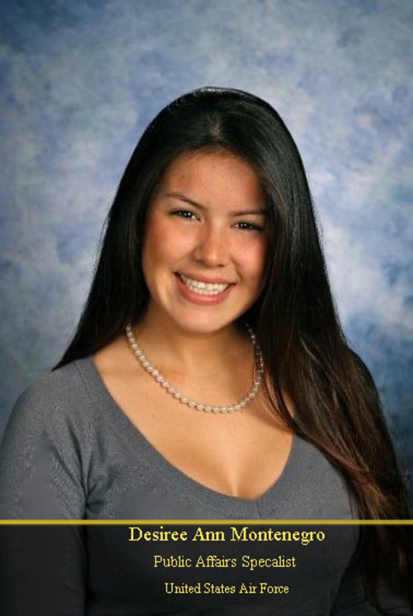 Desiree Ann Montenegro, 27th Special Operations Wing Public Affairs, smiles for the camera as she marks her graduation from California State University of Los Angeles, CA, Apr. 15, 2011. More than 5,000 students graduated from CSULA in 2011, fulfilling their four to six year academic career.