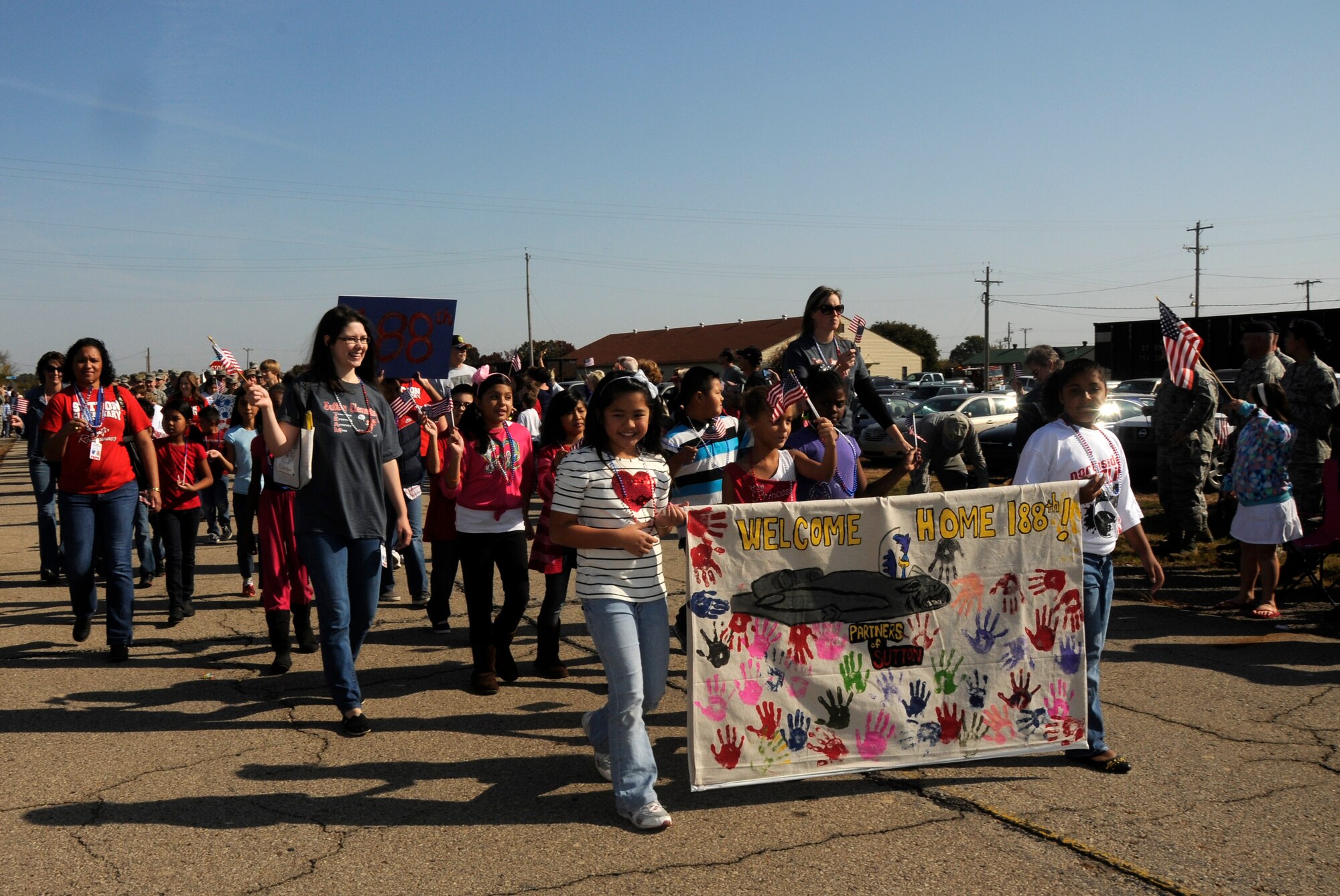 Airmen with the 188th Fighter Wing were recognized for their service during a Veterans Day parade in Barling, Ark., Nov. 3, 2012. The 188th also provided a two-ship flyover with its A-10C Thunderbolt II “Warthogs.” (National Guard photo by Senior Airman Hannah Landeros/188th Fighter Wing Public Affairs)