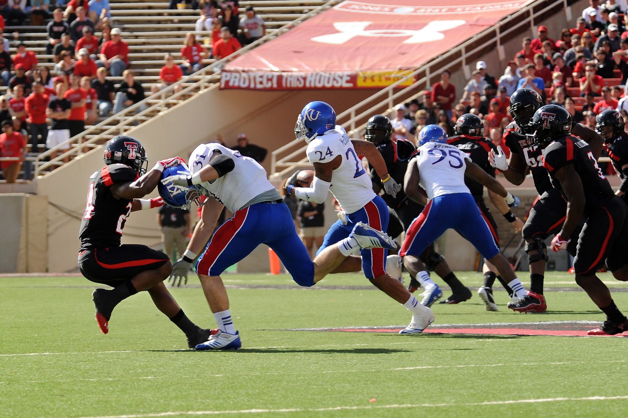 The Texas Tech Red Raiders take on the University of Kansas Jayhawks at the Texas Tech University stadium in Lubbock, Texas, Nov. 10, 2012. All branches of service were invited to attend a free football game for Military Appreciation Day. (U.S. Air Force photo/Senior Airman Jette Carr)