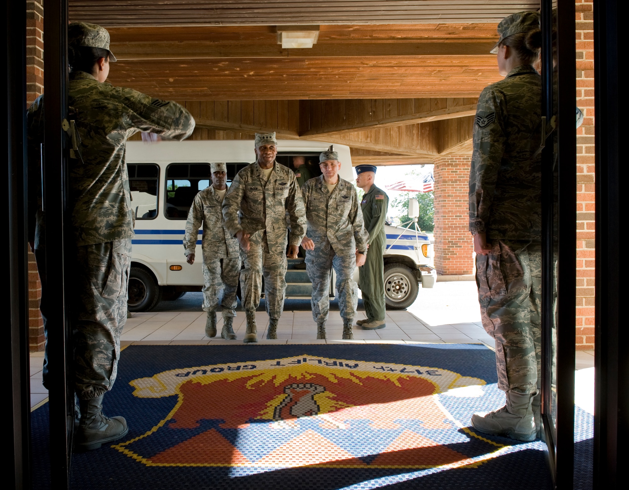 317th Airlift Group Airmen greet Lt. Gen. Darren McDew, 18th Air Force commander, Nov. 7, 2012, at Dyess Air Force Base, Texas. It was his first visit to the 317th AG since assuming command of the 18th AF. (U.S. Air Force photo by Airman 1st Class Jonathan Stefanko/ Released) 