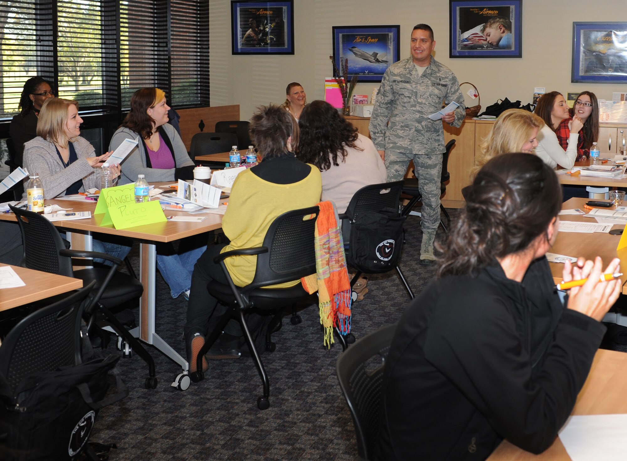 U.S. Air Force Chief Master Sgt. Steve Betancourt, 633rd Medical Group superintendent, welcomes spouses and briefs them about the Langley Hospital during the Heart Link orientation program at Langley Air Force Base, Va., Nov. 9, 2012. Heart Link gives spouses the opportunity to learn about services available both on base and in the local community. (U.S. Air Force photo by Airman 1st Class Teresa Aber/Released)
