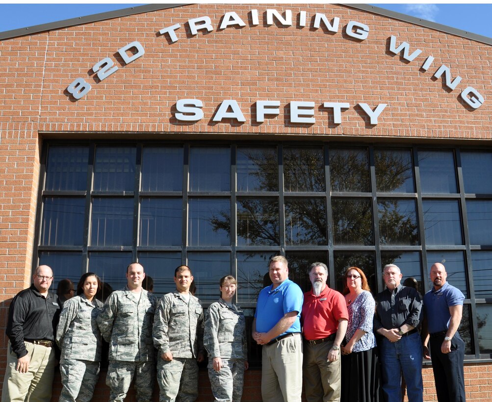 The 82d Training Wing Safety Office staff pose for a photo on November 11, 2012 after receiving three awards from AETC.  The Safety Office received the AETC To Promote Safety award and the AETC Ground Safety Excellence award.  Mr. Mark Schaffer, pictured far left, received the AETC Ground Safety Manager of the Year award.  (US Air Force Photo / Josh Wilson)