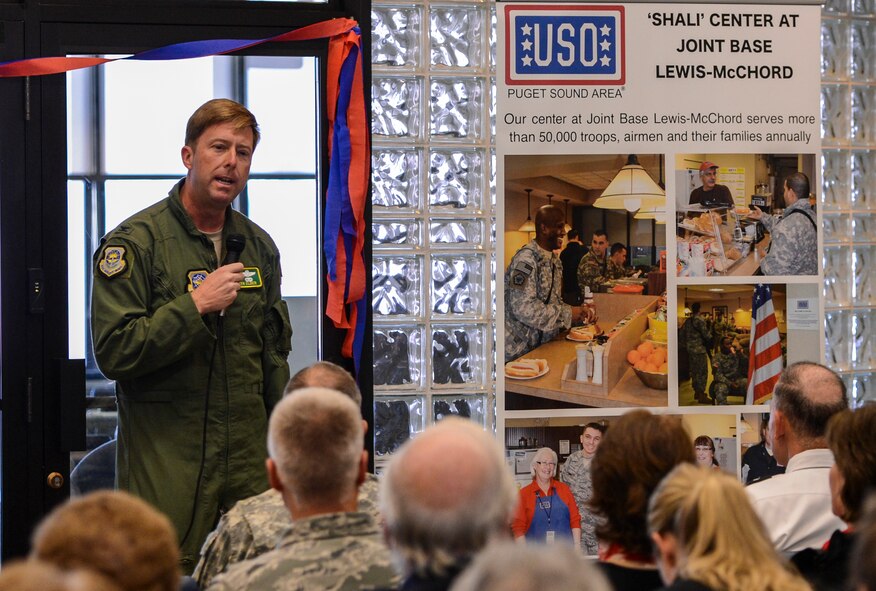 Col. Wyn Elder, 62nd Airlift Wing commander, speaks at the United Service Organization Northwest ribbon cutting ceremony, Nov. 8, 2012, at Joint Base Lewis-McChord, Wash. The newly-renovated USONW 'Shali' Center is named after board member Joan Shalikashvili and her late husband, Army Gen. John Shalikashvili, who served as the Chairman of the Joint Chiefs of Staff from 1993 to 1997. (U.S. Air Force photo/Staff Sgt. Sean Tobin)