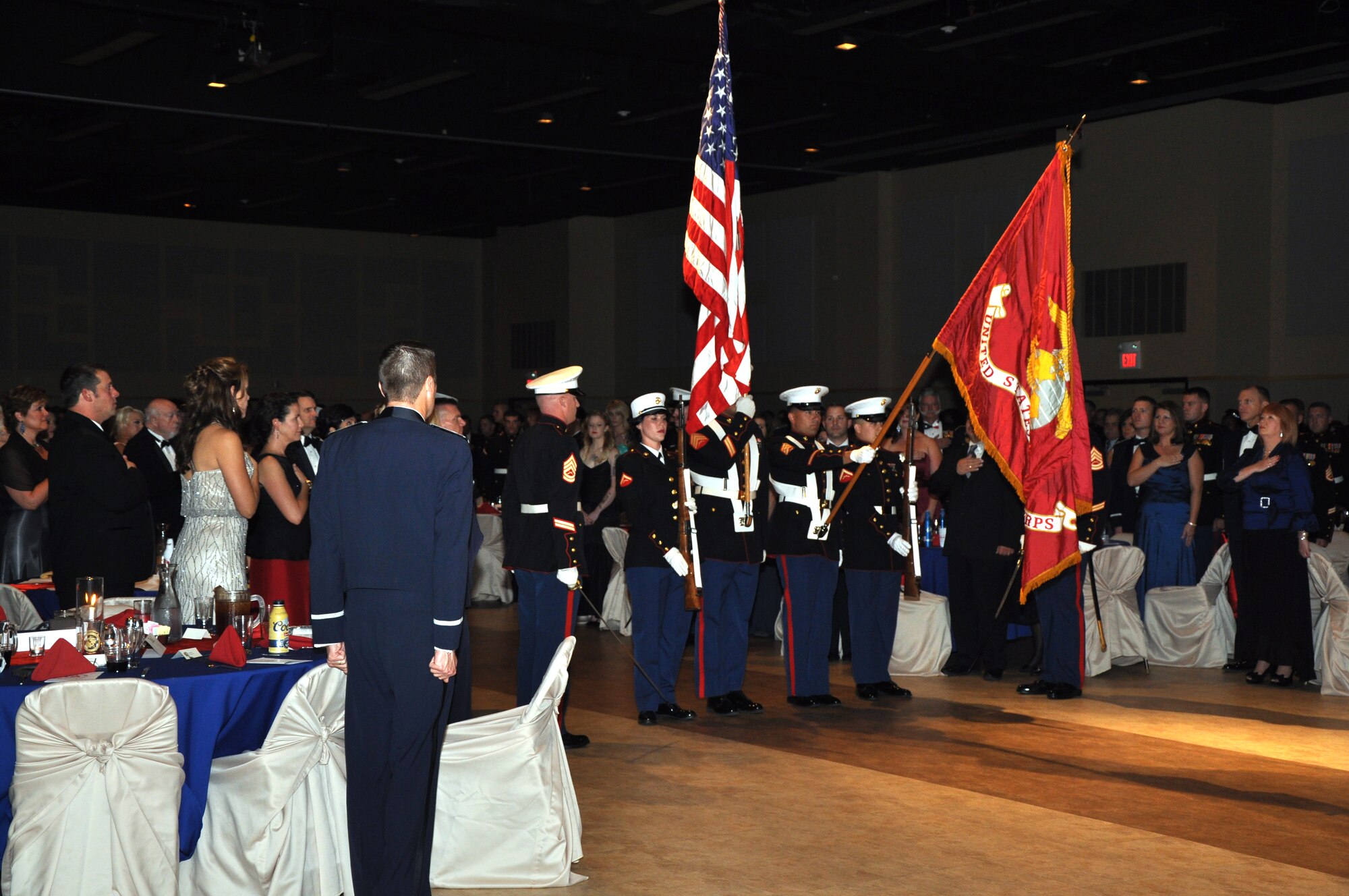 SAN ANGELO, Texas – The Marine Corps Color Guard present, the American flag and Marine Corps flag during the National Anthem marking the beginning of the Marine Corps Ball Nov. 9. They presented both of the flags again before the end of the ceremony. (U.S. Air Force photo/ Airman 1st Class Joshua Edwards)