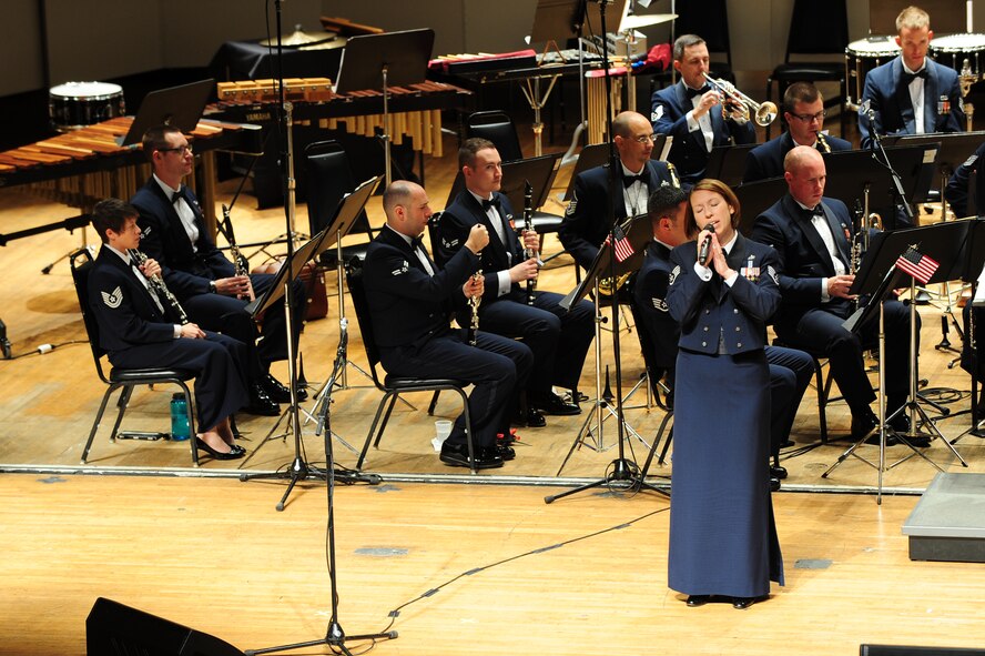 U.S. Air Force Staff Sgt. Rachel Trimble, USAF Heritage of America Band vocalist, sings as the band plays during an appearance at the War Memorial Auditorium in Greensboro, N.C., Nov. 10, 2012. The band performed more than 15 songs for audience-members in celebration of Veteran’s Day. Trimble hails from Colorado. (U.S. Air Force photo/Airman 1st Class Aubrey White/Released)