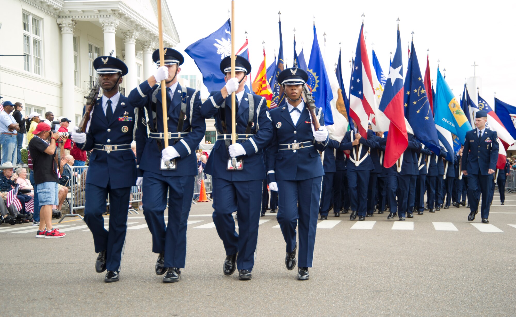 Airmen from Keesler Air Force Base, Miss., march in the 12th annual Gulf Coast Veteran's Parade Nov. 10, 2012, in Gulfport.   Keesler marching units included the honor guard, the 50 state flags carried by the 334th Training Squadron, student marching groups from the 335th and 336th Training Squadrons and the 81st Training Group’s drum and bugle corps.  (U.S. Air Force photo by Adam Bond)
