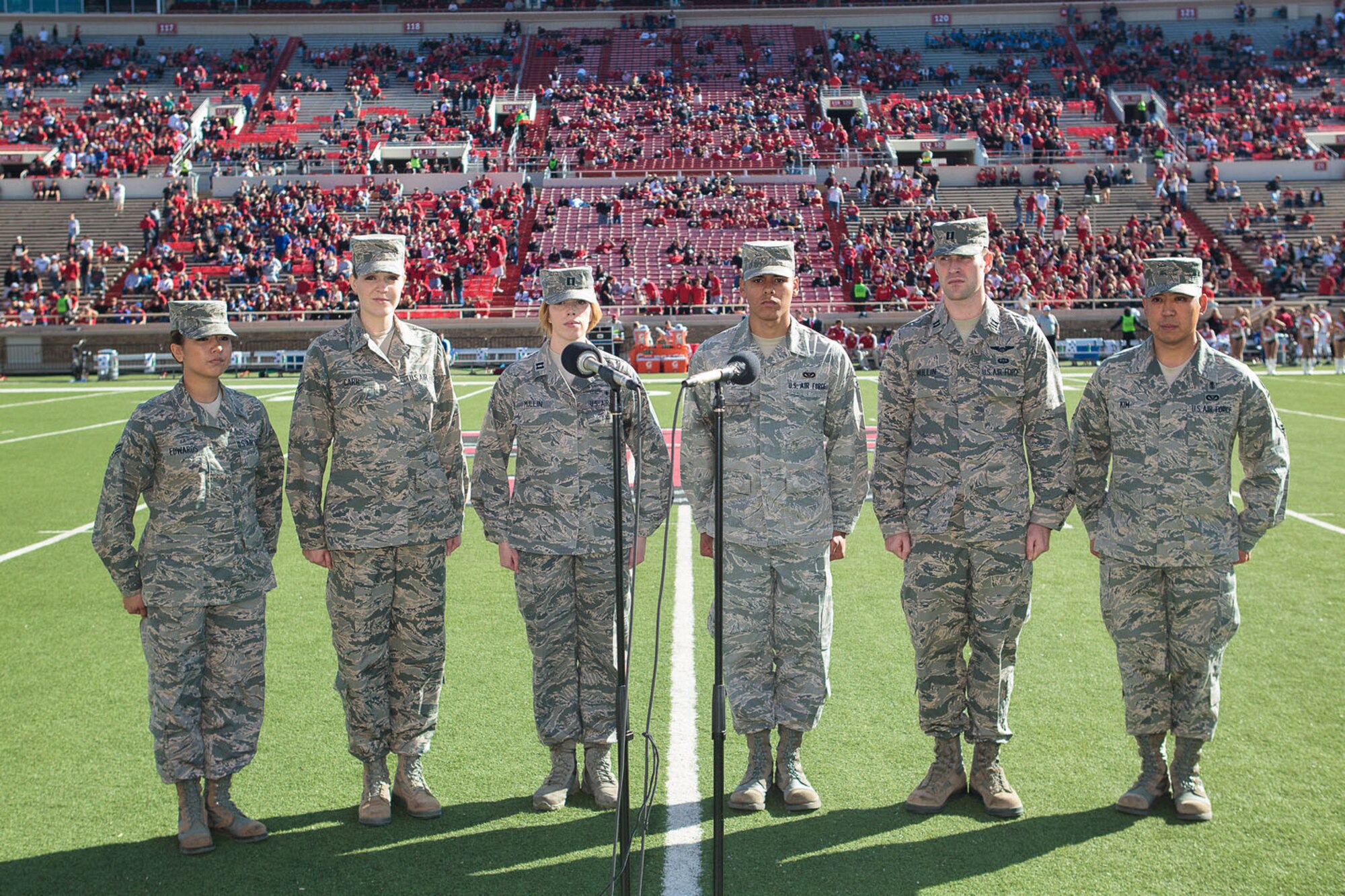 U.S. Air Force members from Cannon Air Force Base, N.M., prepare to sing the national anthem during the Texas Tech University football game in Lubbock, Texas, Nov. 9, 2012. Military members from all branches of service came out to enjoy the game as part of Military Appreciation Day. (Courtesy photo/Texas Tech University) 