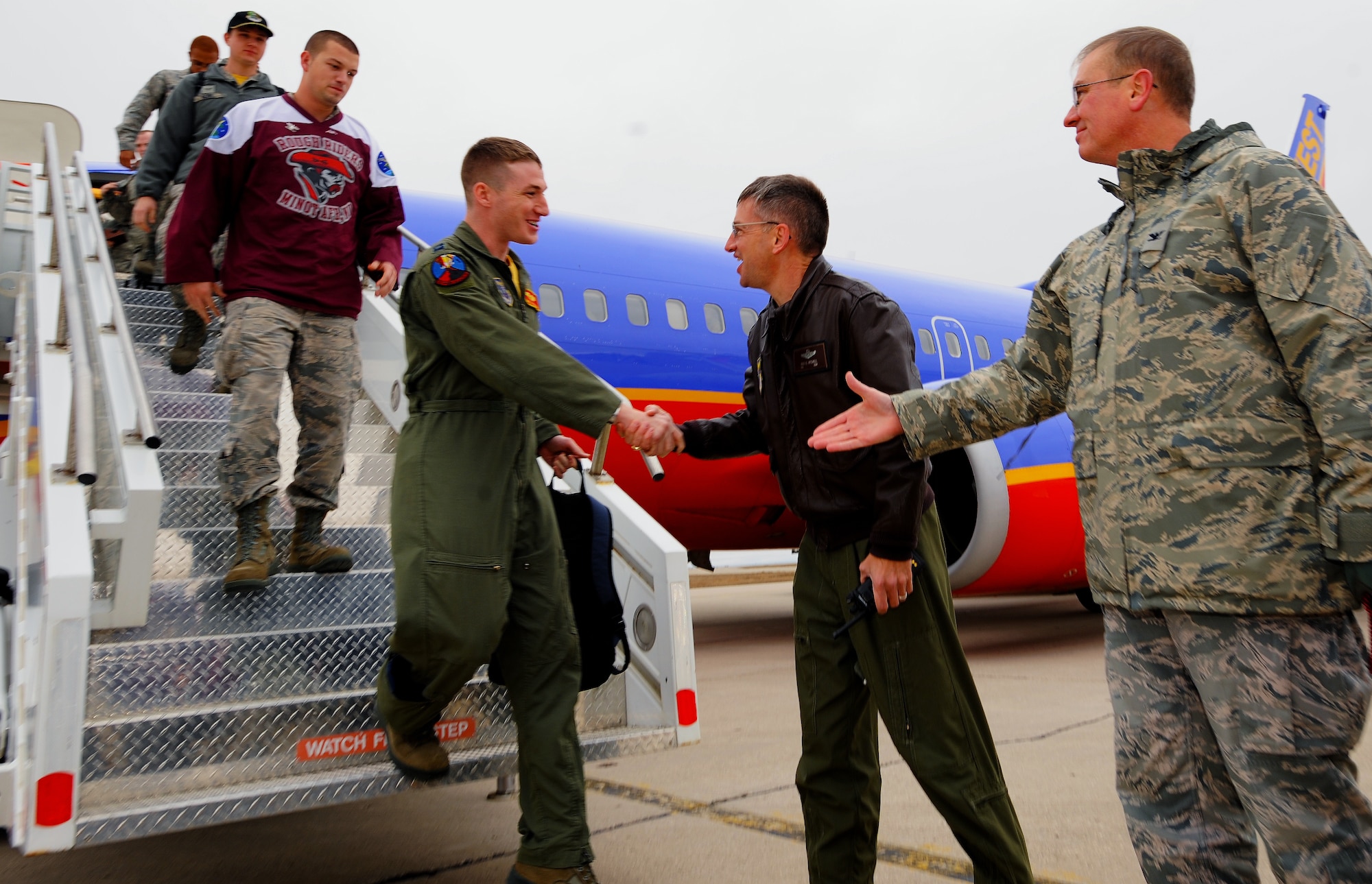 MINOT AIR FORCE BASE, N.D. -- Members of Team Minot arrive here from Barksdale AFB, La., where they gathered for the results of this year's third annual Global Strike Challenge. The competition is an annual event where the top security forces, maintainers, and missile and bomber crews compete to be recognized as the "best of the best" in their fields. It began in July, and ran through the summer. (U.S. Air Force photo/Senior Airman Jose L. Hernandez)
