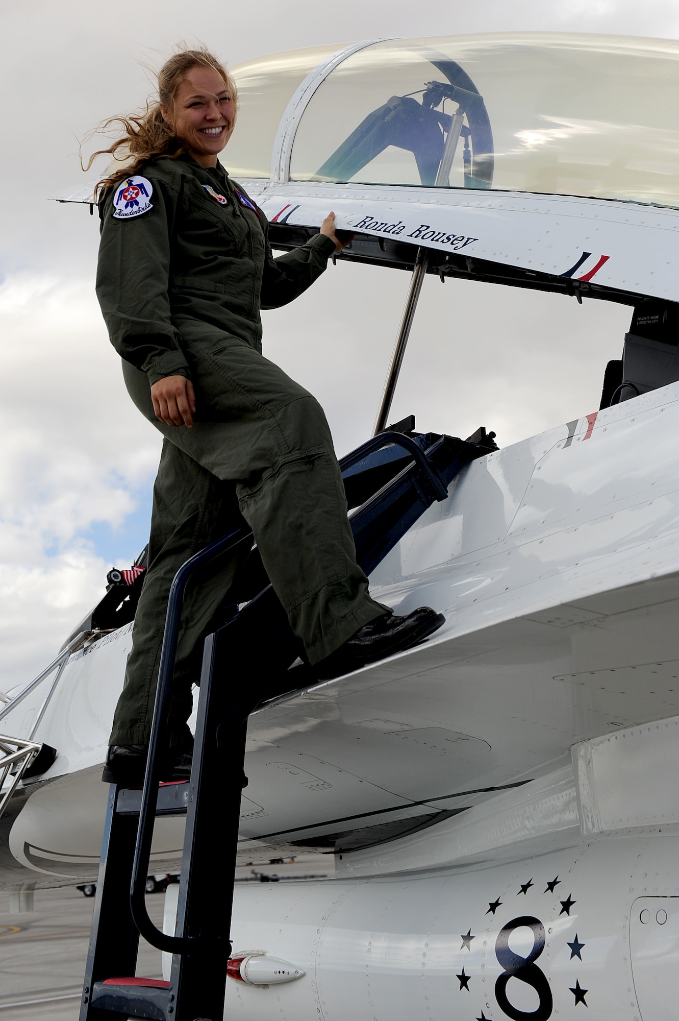 Mixed martial artist champion, Ronda Rousey poses next to her name before her Thunderbirds F-16 flight, at Nellis Air Force Base, Nev., Nov. 9, 2012.
(U.S. Air Force photo/Staff Sgt. Larry E. Reid Jr., Released)