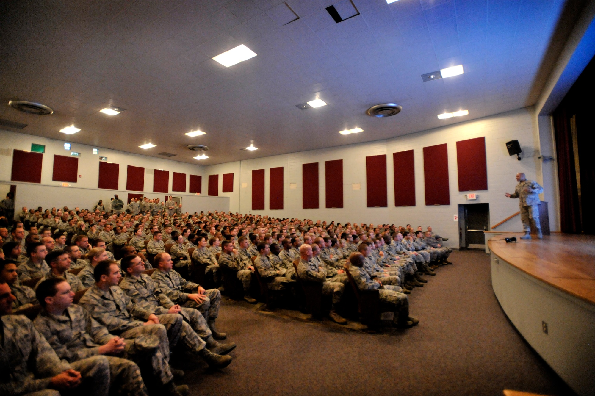 U.S. Air Force Chief Master Sgt. James Wilkerson, 20th Fighter Wing command chief, speaks to Team Shaw Airmen during an enlisted all call, Nov. 9, 2012, Shaw Air Force Base, S.C. Wilkerson conducted two separate all calls during the day to optimize attendance as he conveyed the senior enlisted perspective of the 20th FW Commander’s message and intent. Wilkerson kept Airmen engaged as he shared a few stories and directly answered questions from those in attendance. (U.S. Air Force photo by Staff Sgt. Kenny Holston/Released) 