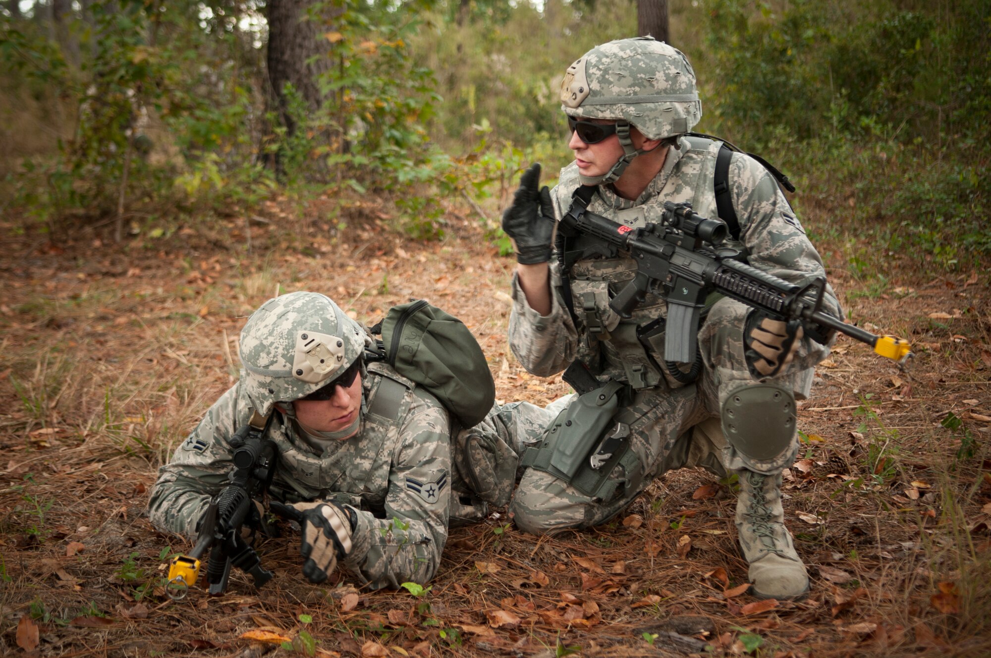 U.S. Air Force members of the 823d Base Defense Squadron Charlie flight prepare to move out during a field training exercise at Moody Air Force Base, Ga., Nov. 8, 2012. During the training, Charlie flight navigated search and recover for a downed remotely piloted aircraft. (U.S. Air Force photo by Airman 1st Class Paul Francis/Released)
