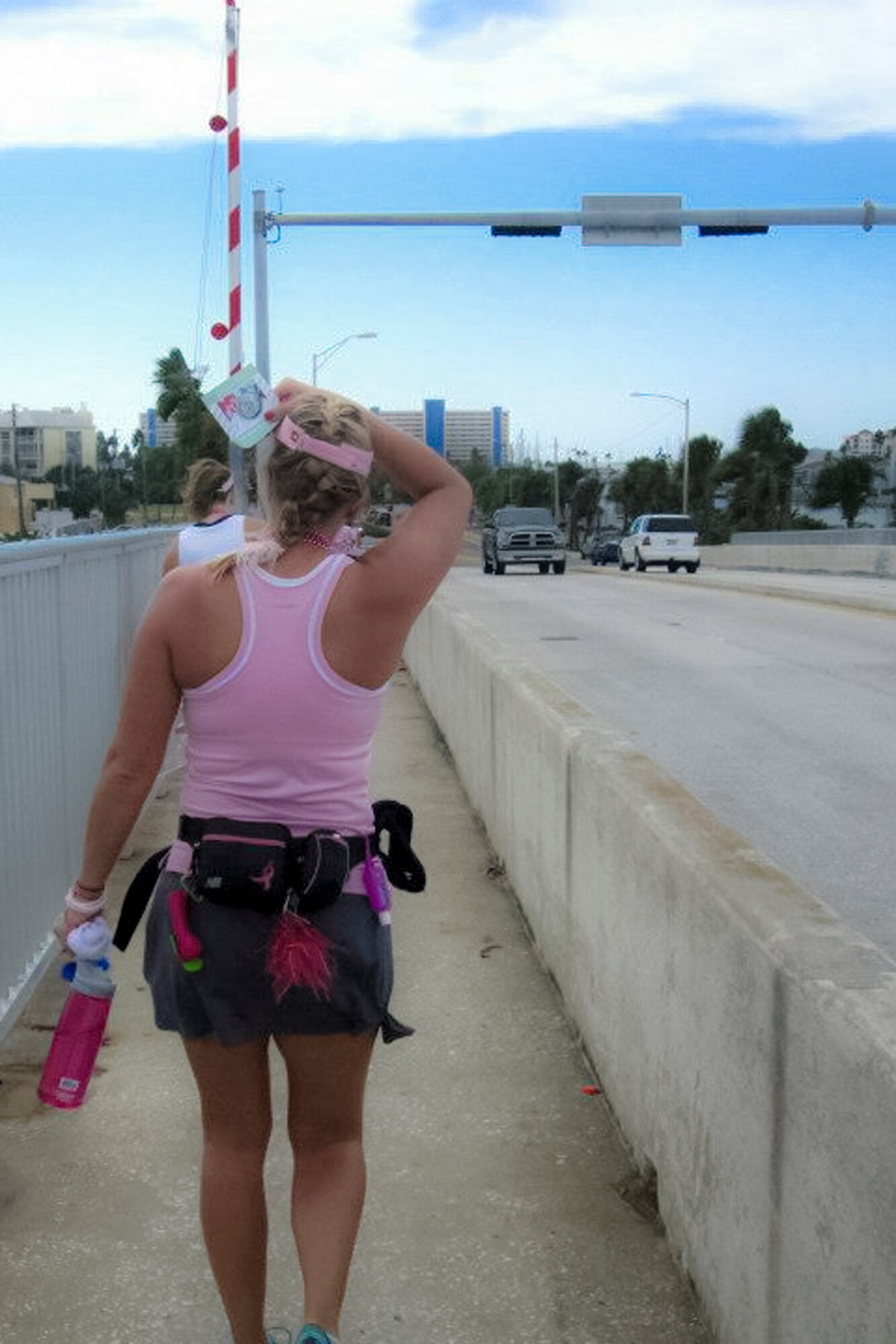 TAMPA, Fla. -- U.S. Air Force Reserve Tech. Sgt.  Valerie Smock, public affairs specialist with the 910th Airlift Wing at the Youngstown Air Reserve Station, Ohio,  walks through the streets of Tampa Oct. 27, 2012 during the Susan G. Komen 3-Day for a Cure here. Smock participates yearly in the 60-mile walk to help raise awareness and find a cure for breast cancer. Courtesy photo  
