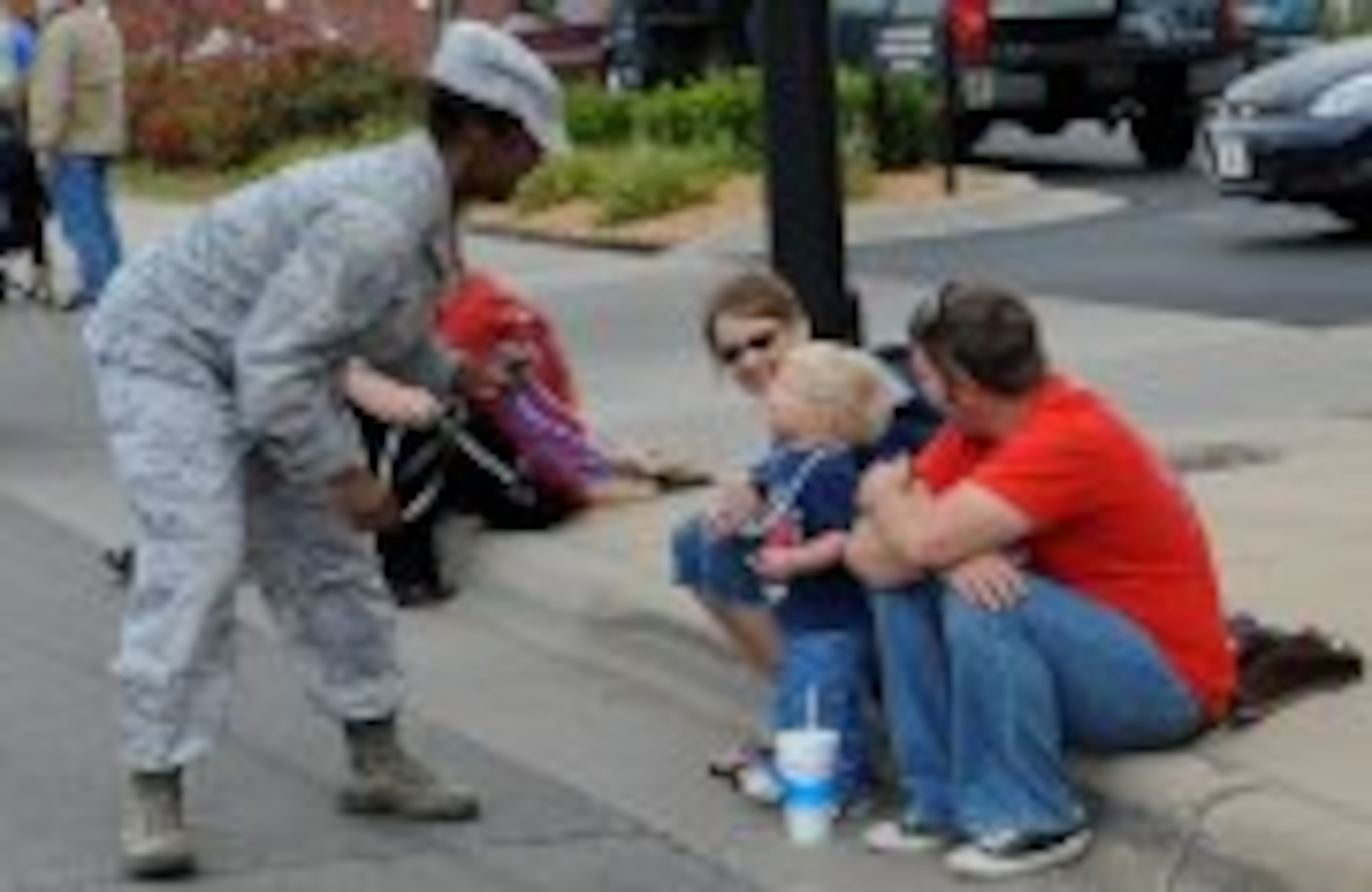 McConnell Airmen participate in the 2012 Wichita Veterans Day Parade Nov 10, 2012, Wichita Kan. More than 60 Airmen and their families walked in honor of those who have served in the U.S. armed forces. (U.S. Air Force photo/2nd Lt. Jessica Brown).