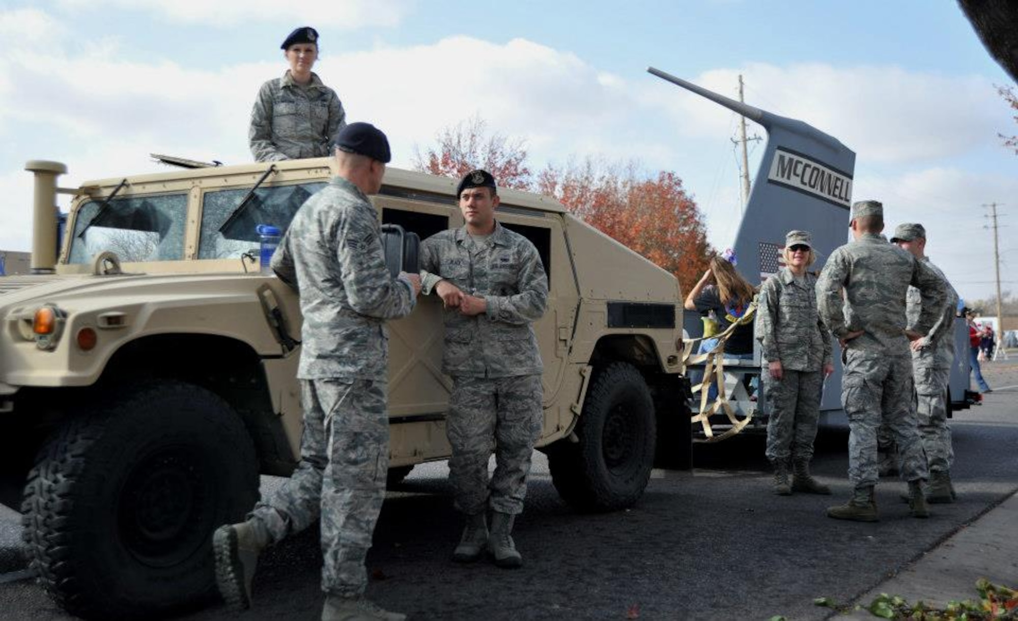 Airmen from the McConnell prepare to march in the 2012 Wichita Veterans Day parade Nov. 10, 2012, in Wichita, Kan. The parade allows the local community to see Airmen, soldiers, veterans and military equipment from different eras. (U.S. Air Force photo/Staff Sgt. Abigail Klein)