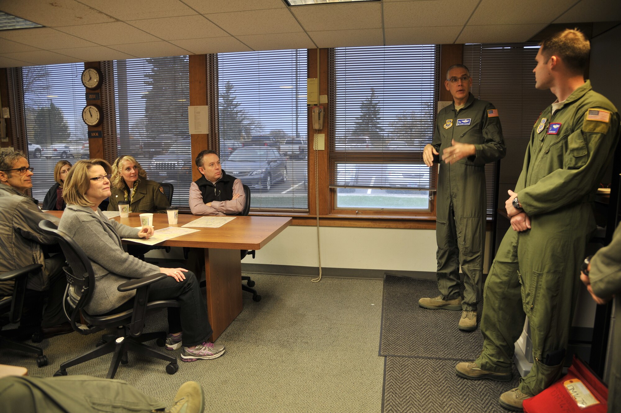 Col. Shawn Teagan, 92nd Operations Group commander, speaks with Spokane Mayor David Condon and his Cabinet Members during a pre-flight briefing at base operations at Fairchild Air Force Base, Wash., Nov. 8, 2012. During their visit, the mayor and his staff flew on a refueling training mission over the California and Oregon border. (U.S. Air Force photo by Senior Airman Mary O'Dell)