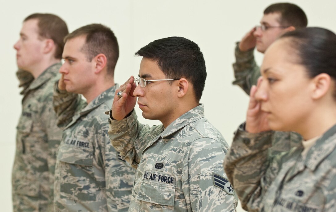 Senior Airman Daniel Sirias, 28th Bomb Wing knowledge operations manager, practices drill commands with fellow Airmen during Airman Leadership School at Ellsworth Air Force Base, S.D., Nov. 2, 2012. ALS is an education program that prepares Airmen for positions of greater responsibility and covers various topics including warfare leadership, international security studies, communication and military professionalism. (U.S. Air Force photo by Airman 1st Class Zachary Hada/Released)