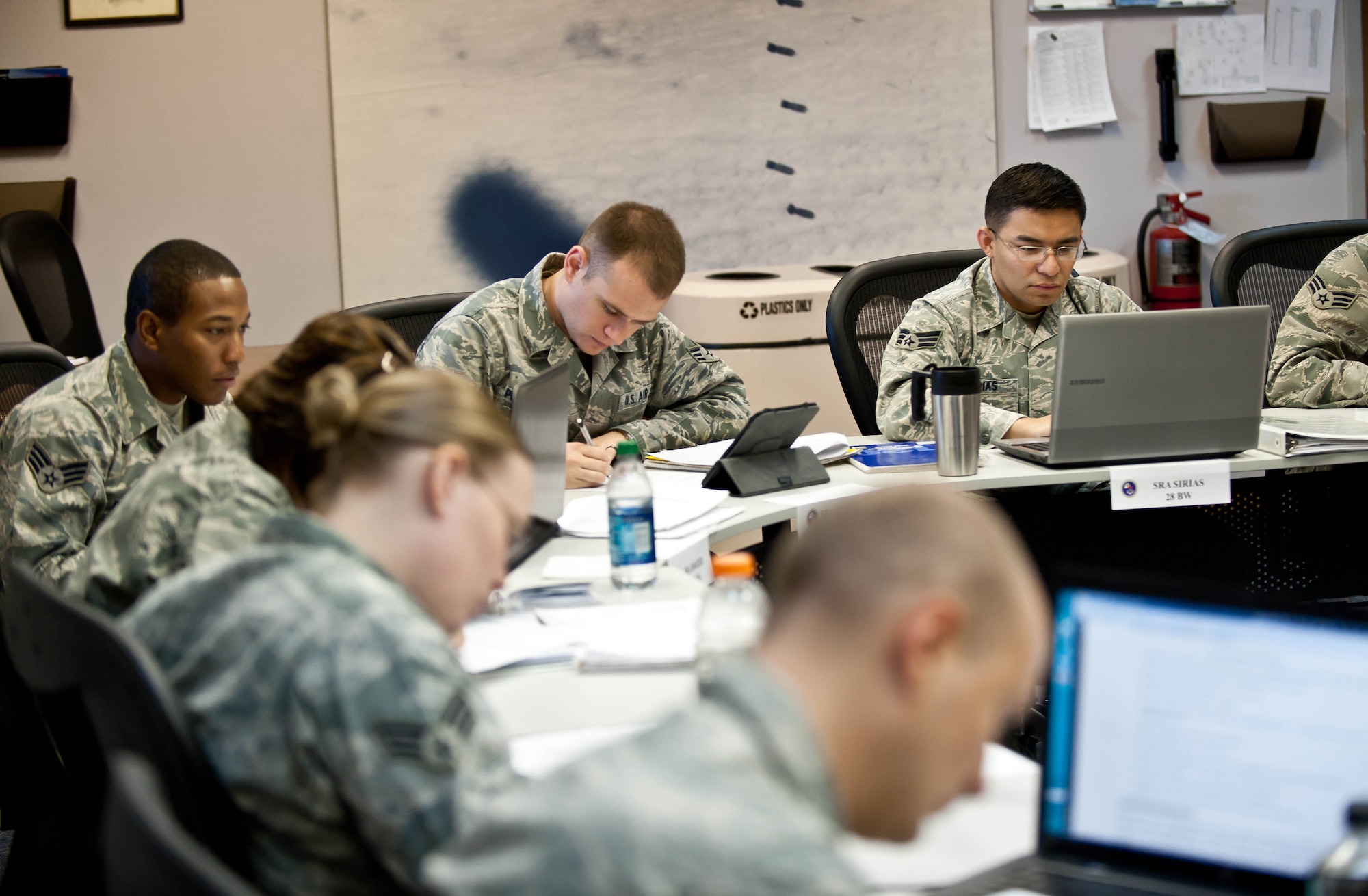 Airmen participate in NCO training exercises and scenarios during an Airman Leadership School class at Ellsworth Air Force Base, S.D., Oct. 17, 2012. In order for the Air Force to project air, space and cyberspace dominance, it requires the employment of dedicated and professional warfighting Airmen who can supervise and lead its workforce. (U.S. Air Force photo by Airman 1st Class Zachary Hada/Released)