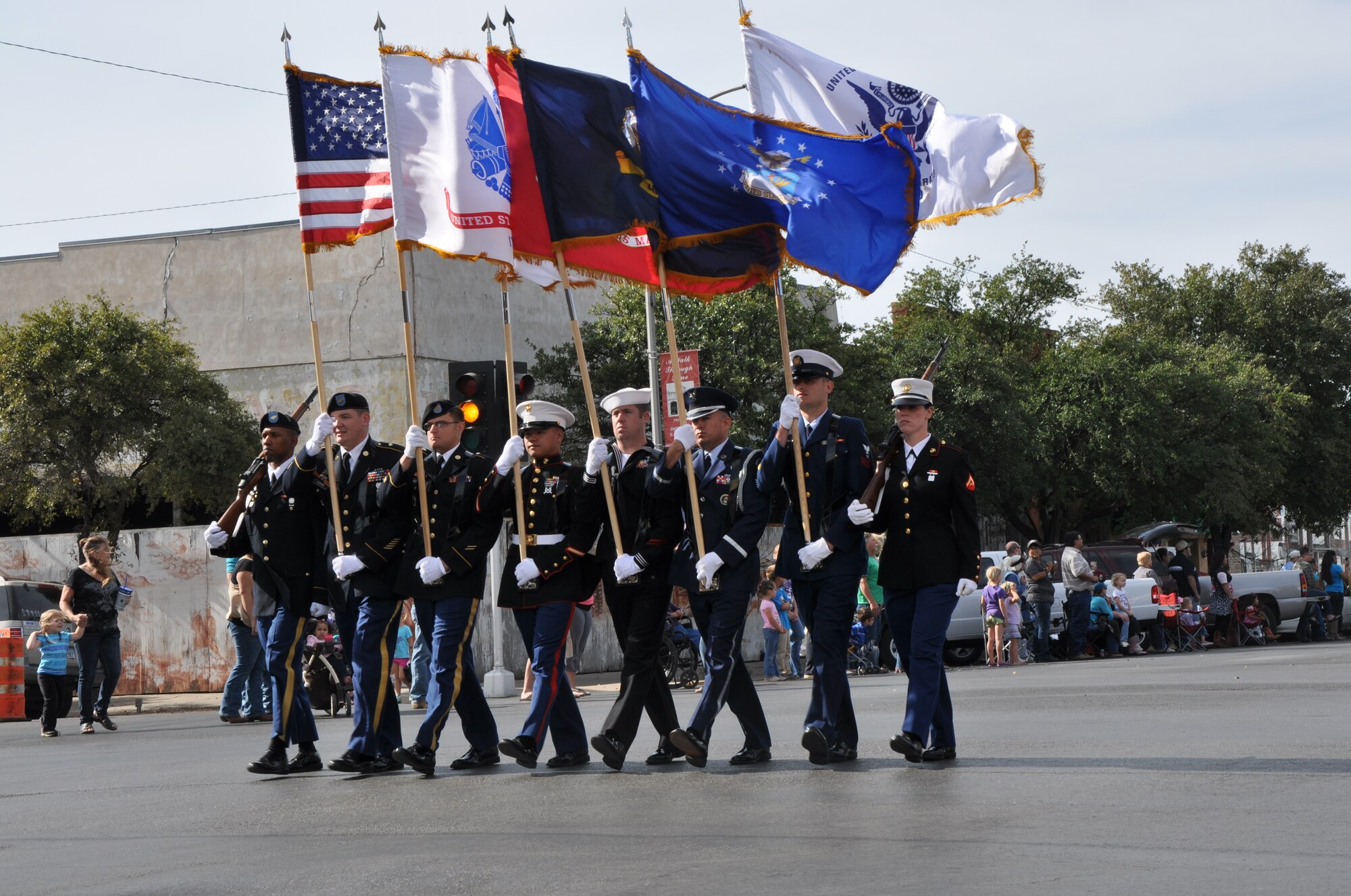 SAN ANGELO, Texas – The Goodfellow Joint Service Color Guard leads the Veterans’ Day Parade in San Angelo Nov. 10. They were followed by units from Goodfellow and various other groups and organizations. (U.S. Air Force photo/ Airman 1st Class Joshua Edwards)