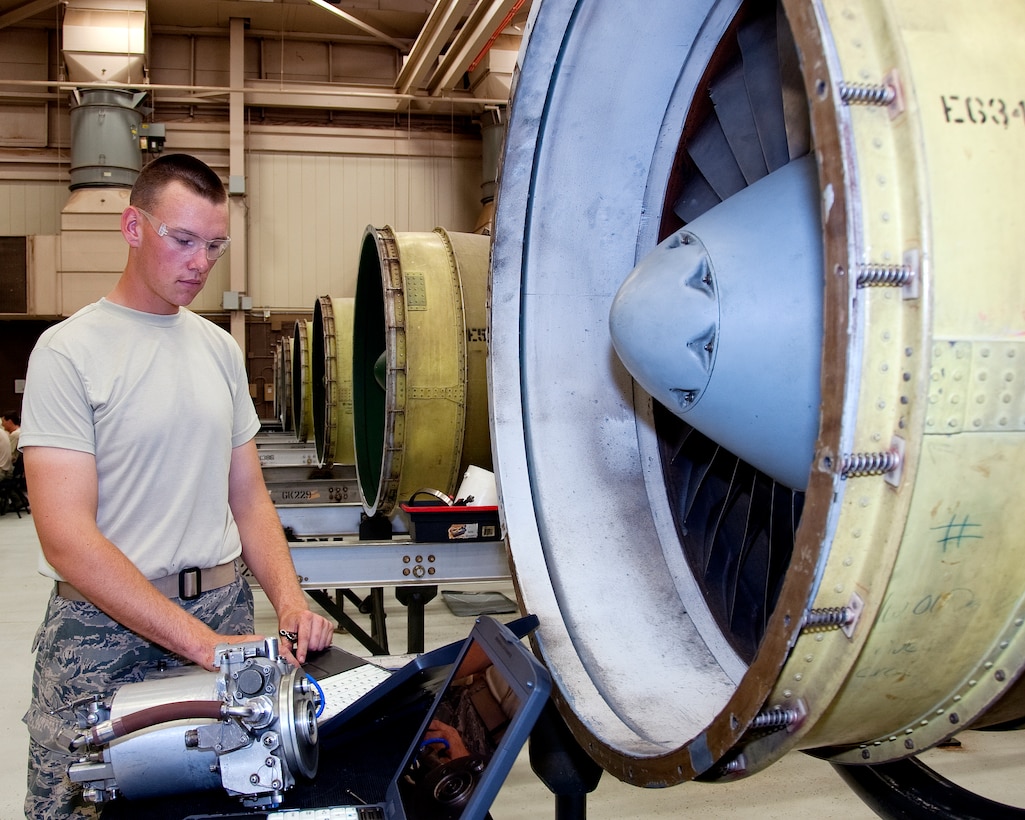 Airman Spencer Corry, 361st Training Squadron, inspects the main fuel pump and main fuel control on a TF-34 engine off of an A-10 aircraft on August 03, 2012 at Sheppard Air Force Base, Texas. Aerospace propulsion training is broken down into four apprentice courses.  (US Air Force Photo by Frank Carter)