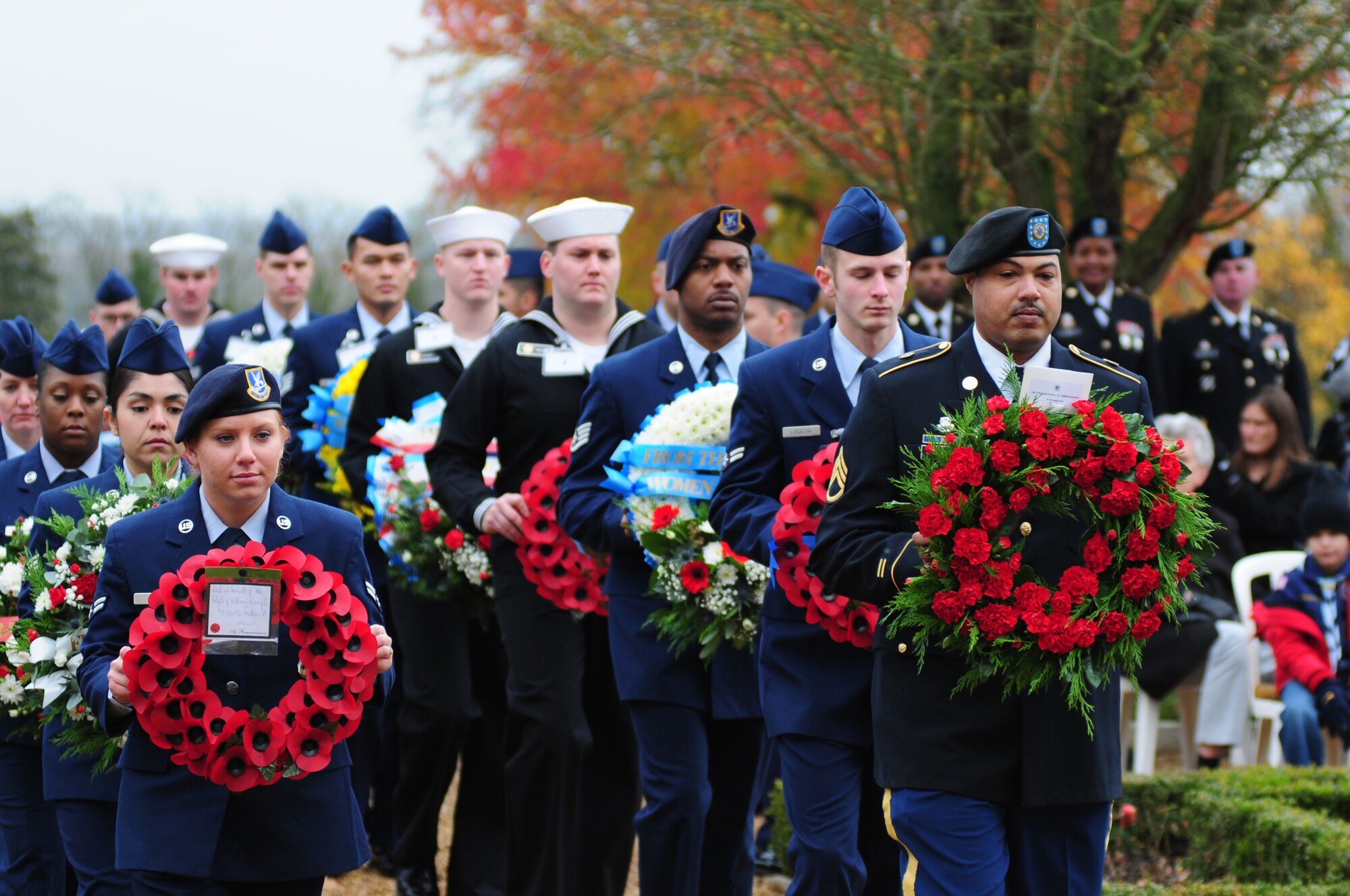 CAMBRIDGE, England – U.S. service members from across the U.K. march with wreaths to be laid at the Madingley American Cemetery Nov. 12, 2012. The annual Veterans Day ceremony was hosted by the 501st Combat Support Wing, RAF Alconbury, to honor and remember those who gave their lives in wars in Europe. (U.S. Air Force photo by Airman 1st Class Cory D. Payne)
