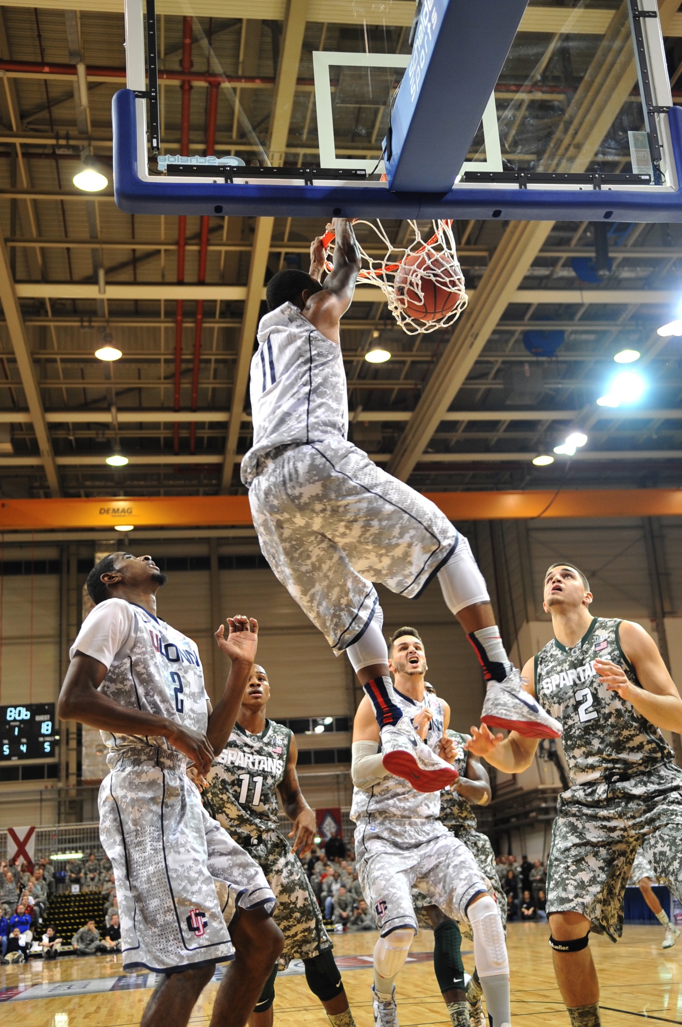 University of Connecticut player Ryan Boatright dunks the ball against the Michigan State Spartans during t the Armed Forces Classic basketball game at Ramstein Air Base, Germany, Nov. 10, 2012.  Connecticut overcame Michigan 66-62. (U.S. Air Force photo/Master Sgt. Wayne Clark)