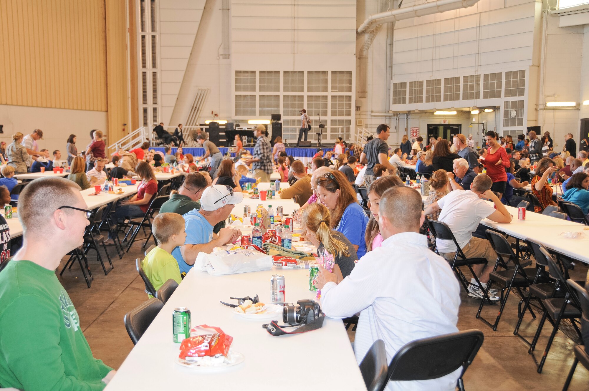 Families from Team Joint STARS gather together for a time of food, fun, and fellowship during the 116th and 461st Air Control wings annual Family Day celebration at Robins Air Force Base, Ga., Nov. 3, 2012. This marked the 10th annual Family Day for JSTARS.  The yearly event provides an opportunity to thank families for their support. (National Guard photo by Tech. Sgt. Timothy Neville/Released)