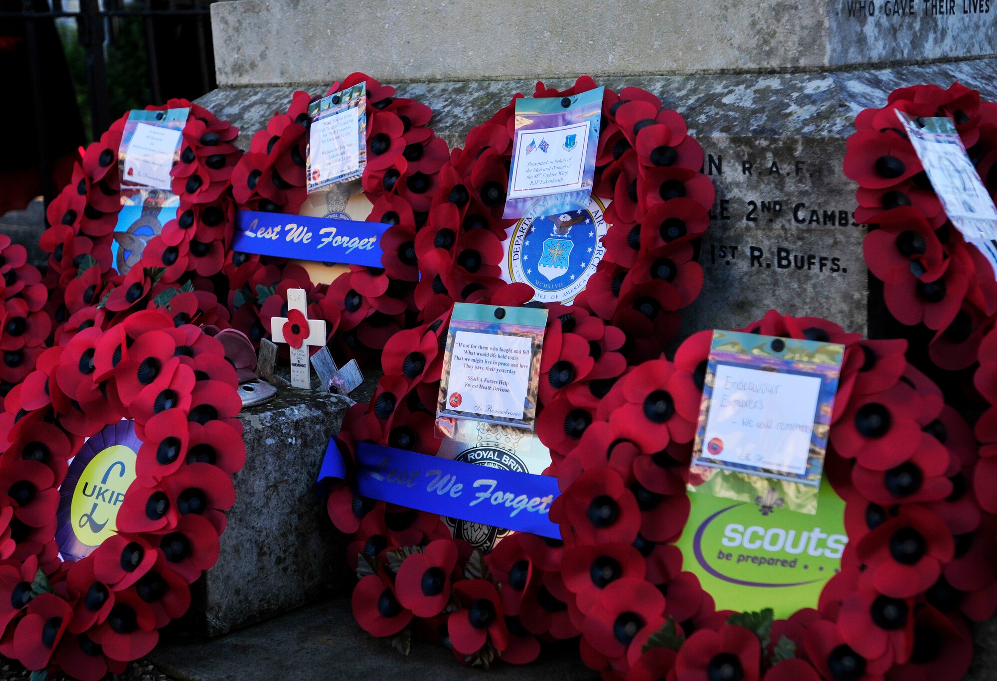 LAKENHEATH, England - Poppy wreaths lie at the base of the Lakenheath War Memorial during a Remembrance Day ceremony in Lakenheath village Nov. 11, 2012. Members of the 48th Fighter Wing and local community came together to pay their respects to those who made the ultimate sacrifice. (U.S. Air Force photo by Senior Airman Tiffany M. Grigg) 