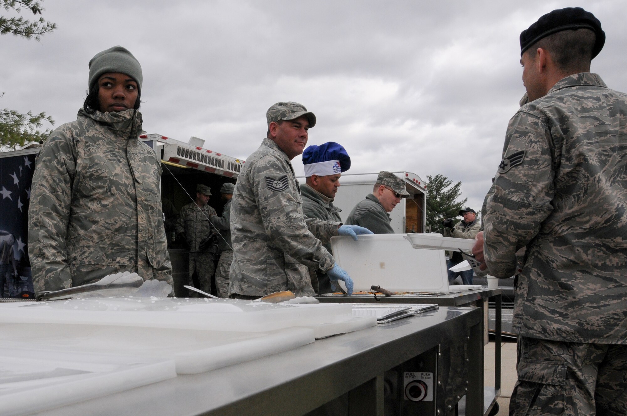 Airman from the 113th Force Support Squadron set up a new mobile field kitchen during a demonstration at Joint Base Andrews, Md., Nov. 3. The Disaster Relief Mobile Kitchen Trailer  can deploy to natural disaster sites to provide hot meals to relief workers and Airmen working in austere conditions. (U.S. Air force photo by Airman 1st Class Sumena Leslie/Released)