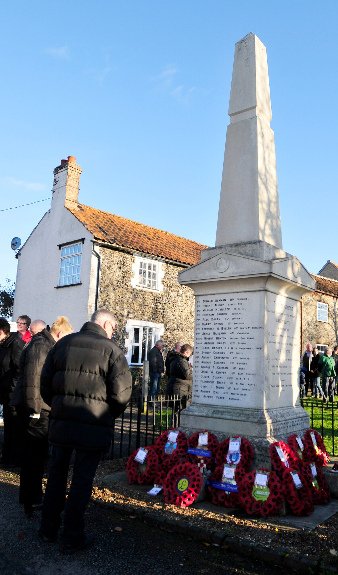 LAKENHEATH, England - Members of the local community pay their respects at the Lakenheath War Memorial during a Remembrance Day ceremony in Lakenheath village Nov. 11, 2012. Members of the 48th Fighter Wing and local community came together to pay their respects to those who made the ultimate sacrifice. (U.S. Air Force photo by Senior Airman Tiffany M. Grigg) 