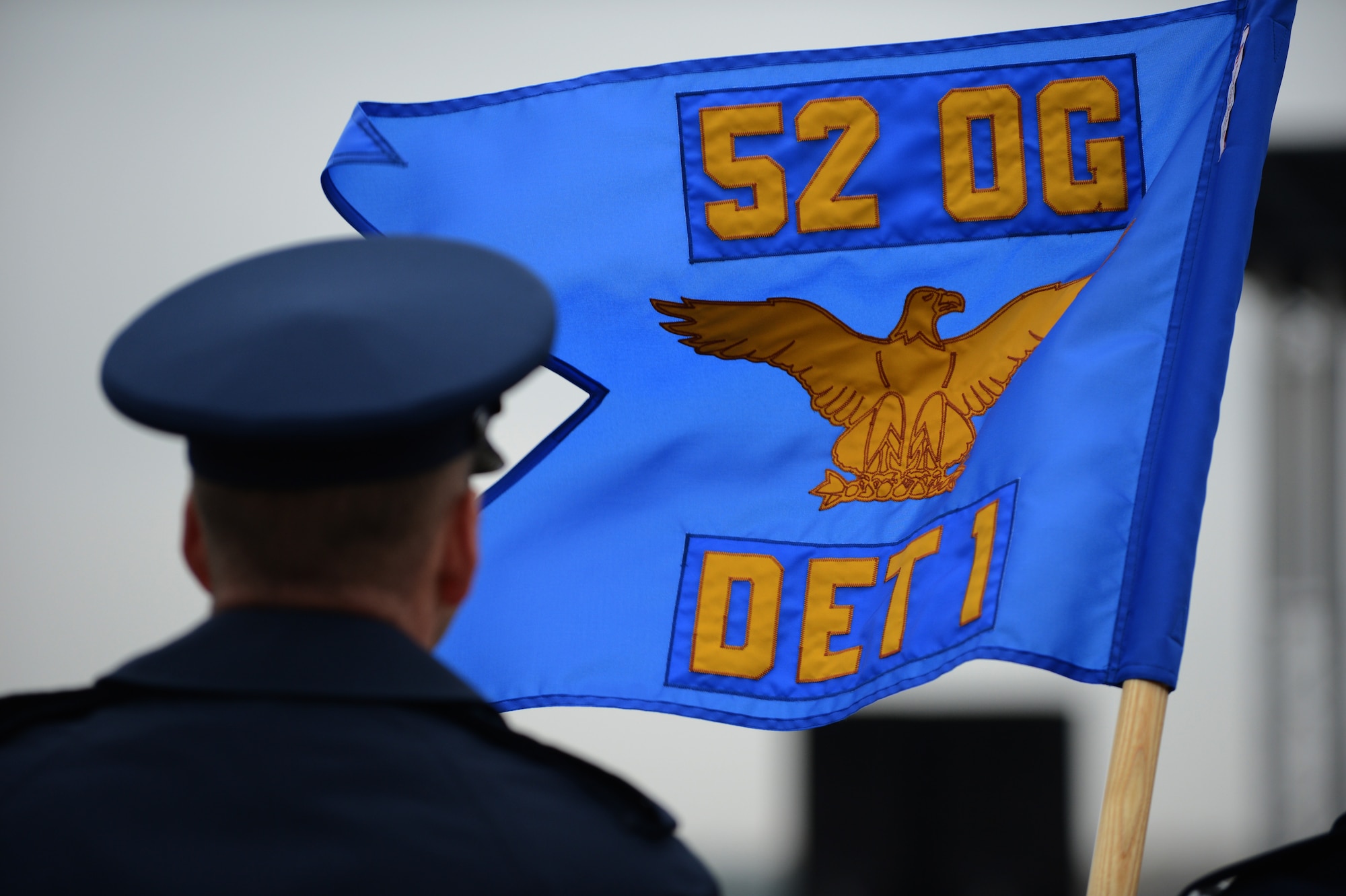 LASK AIR BASE, Poland --The 52nd Operations Group, Detachment 1, guidon stands on the flightline during an Aviation Detachment (AV DET) activation ceremony on Lask Air Base, Poland Nov. 9, 2012. The AV DET will be an enduring presence with 10 Airmen, but F-16 and C-130 crews and aircraft will rotate periodically for training, where the total number of personnel could surge up to 250.  The AV DET supports Poland's continued defense modernization and standardization with the U.S. and North Atlantic Treaty Organization. (U.S. Air Force photo by Airman 1st Class Gustavo Castillo/Released)