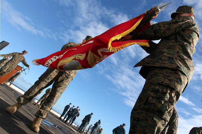 Marines with the 24th Marine Expeditionary Unit case the Marine Corps colors after a cake-cutting ceremony on the flight deck of the USS New York to celebrate the Marine Corpsâ€™ 237th birthday, Nov. 10, 2012. This was the first of perhaps many more Marine Corps birthday celebrations aboard the New York, built with seven-and-a-half tons of steel from the World Trade Center, as she sails on her maiden deployment. The 24th MEU is deployed with the Iwo Jima Amphibious Ready Group and is currently in the 6th Fleet Area of Responsibility as a disaster relief and crisis response force. Since deploying in March, they have supported a variety of missions in the U.S. Central and European Commands, assisted the Navy in safeguarding sea lanes, and conducted various bilateral and unilateral training events in several countries in the Middle East and Africa. The 24th MEU is scheduled to return to their home bases in North Carolina later this year. (U.S. Marine Corps photo by Staff Sgt. Robert Fisher III/Released)
