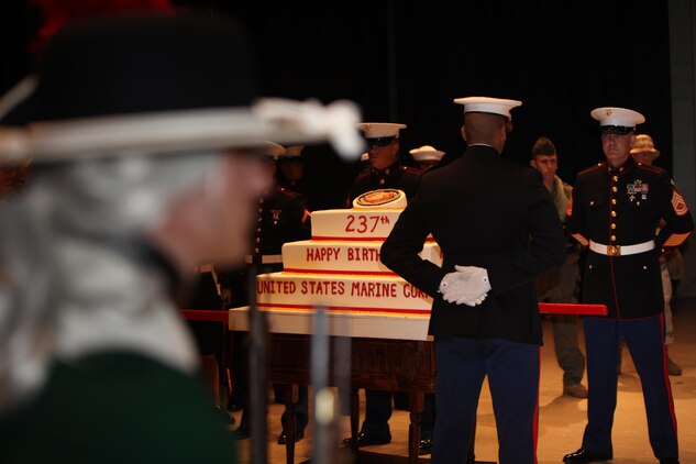 The cake escorts await the cutting of the cake before the cake cutting ceremony of the Cherry Point 237th Marine Corps Ball Ceremony at the station theater Nov. 8.