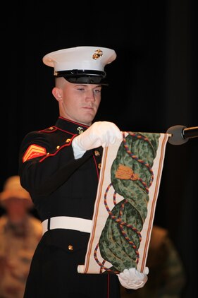 A Marine reads the birth message from the 13th Commadant Gen. John A. Lejeune during the Cherry Point 237th Marine Corps Ball Ceremony at the station theater Nov. 8.